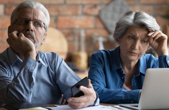 Worried Elderly Couple Thinking about Financial Problems