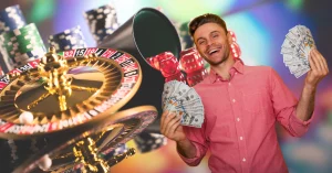 Casino - Gambling Games - Portrait of Happy Man Holding a Lot of Cash