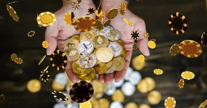 Close-Up Shot of Person Holding Cryptocurrency - Casino Chips Dropping